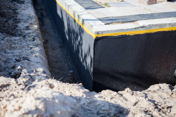 Professional Emergency Waterproofing technician working in Coral, MI